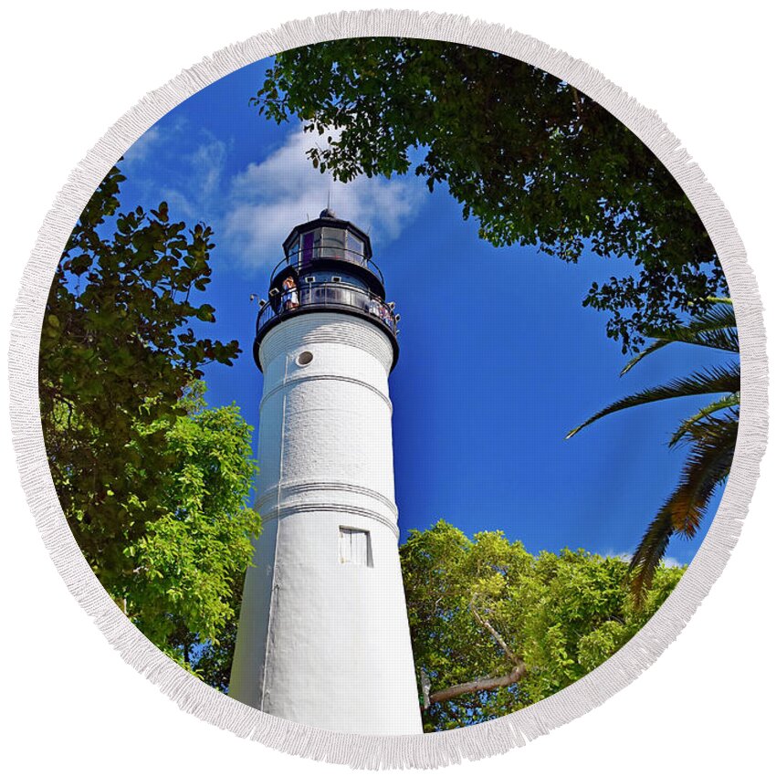 The Key Round Beach Towel featuring the photograph The Key West Lighthouse by Monika Salvan