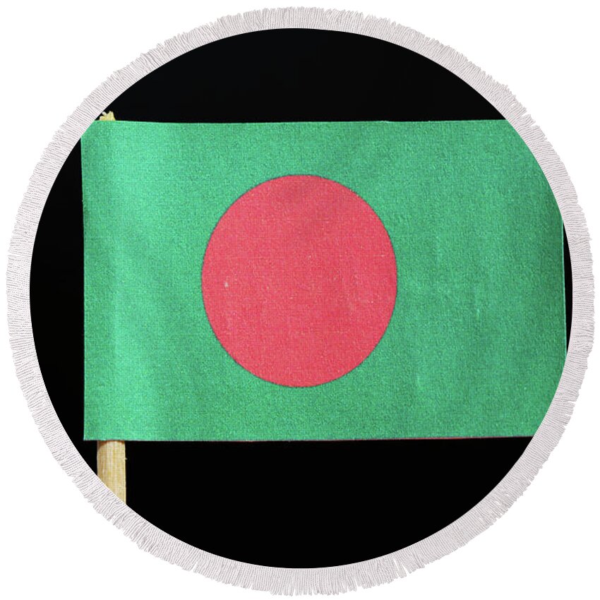  Bangladesh Round Beach Towel featuring the photograph The national flag of Bangladesh on toothpick on black background. A red disc on a green field by Vaclav Sonnek