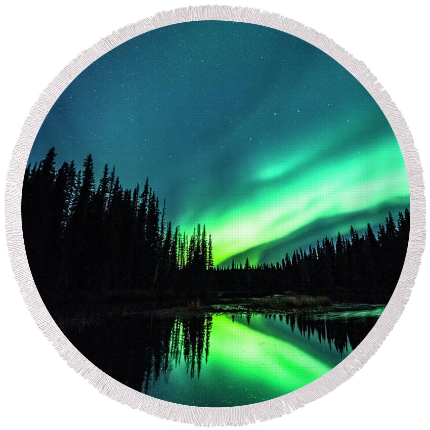 Green Round Beach Towel featuring the photograph The Northern Lights over Alaska by David Morefield