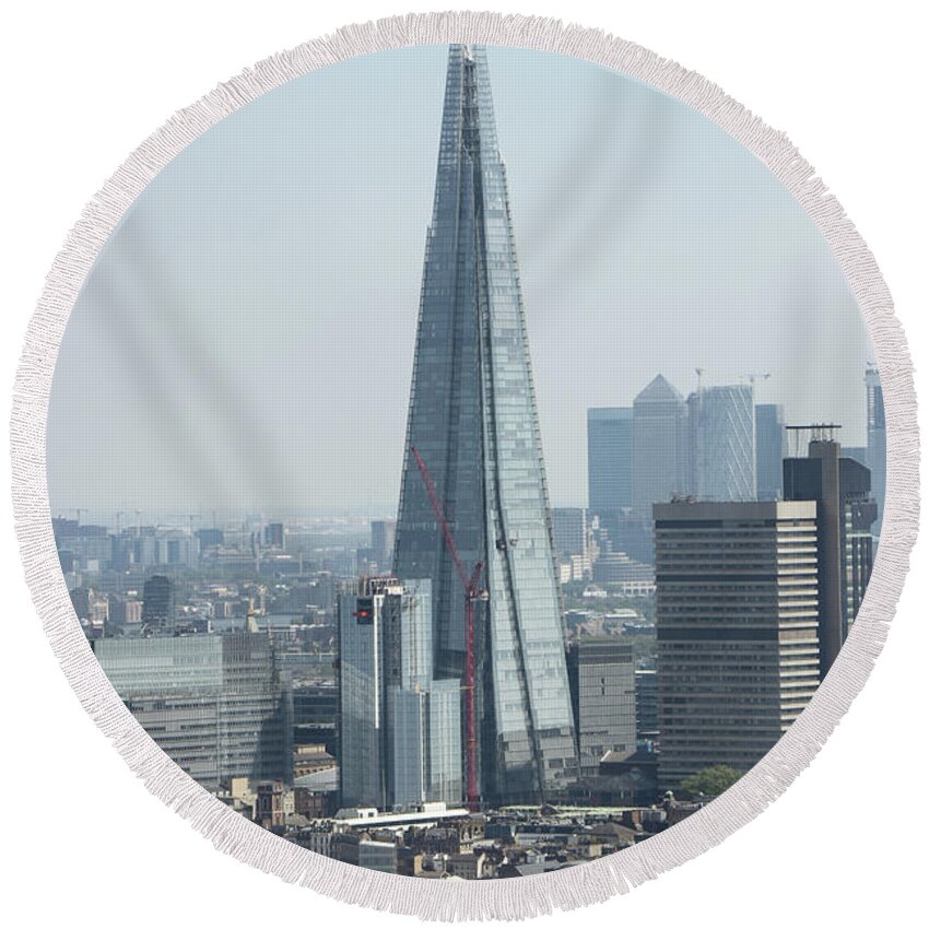 London Round Beach Towel featuring the photograph The Shard, also referred to as the Shard of Glass, Shard London Bridge and formerly London Bridge Tower is one of the biggest pride in London. The mos beautiful skyscraper in United Kingdom. Tallest by Vaclav Sonnek