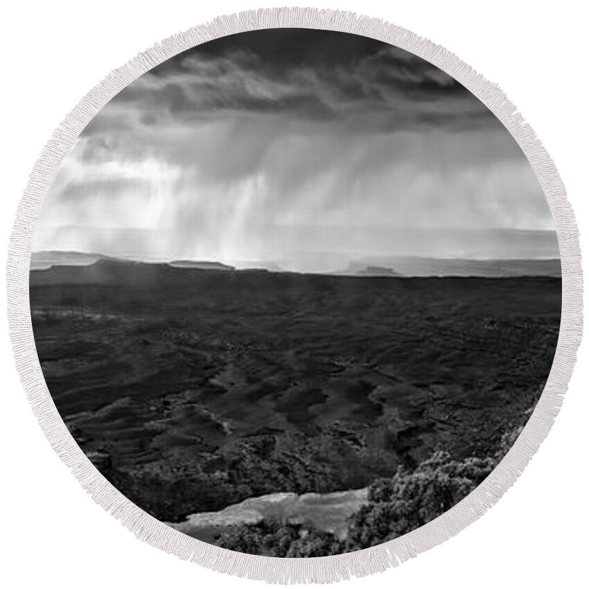 America Round Beach Towel featuring the photograph Thunderstorm over Grand View Point Overlook in canyonlands by Jean-Luc Farges