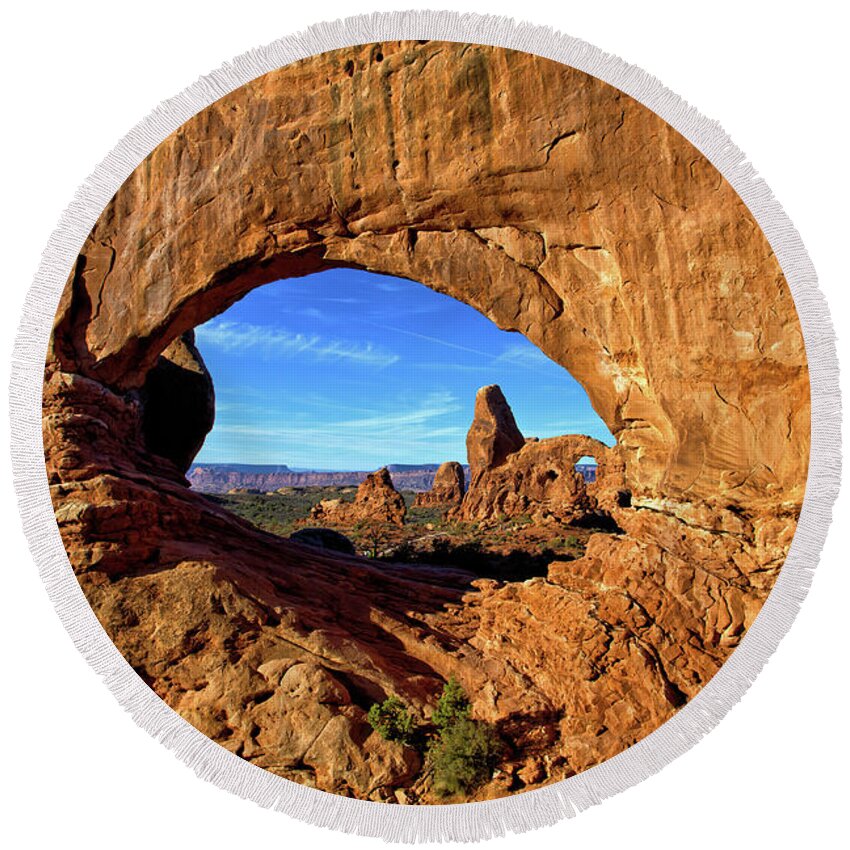Turret Arch Round Beach Towel featuring the photograph Turret Arch by Bob Falcone