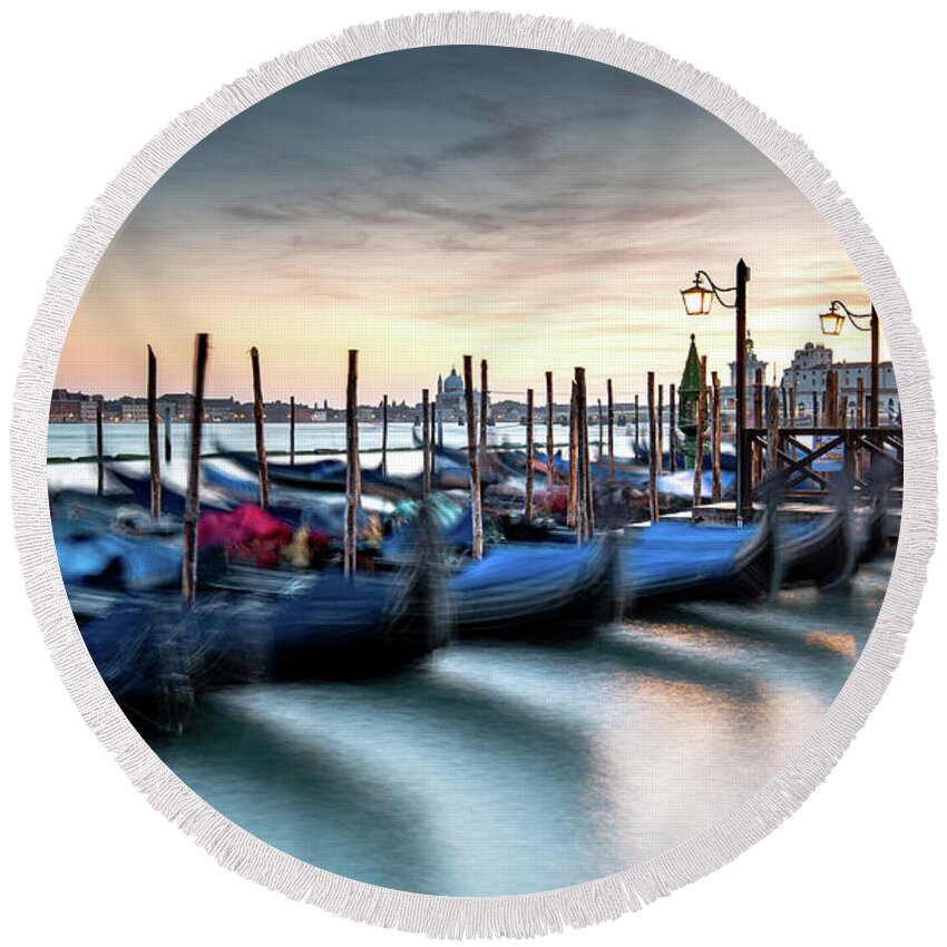 Gondola Round Beach Towel featuring the photograph Venice Gondolas moored at the San Marco square. by Michalakis Ppalis