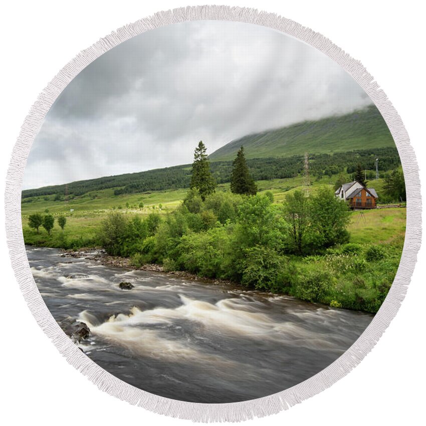 Bridge Of Orchy Round Beach Towel featuring the photograph Water flowing in the river. River Orchy Highlands of Scotland by Michalakis Ppalis