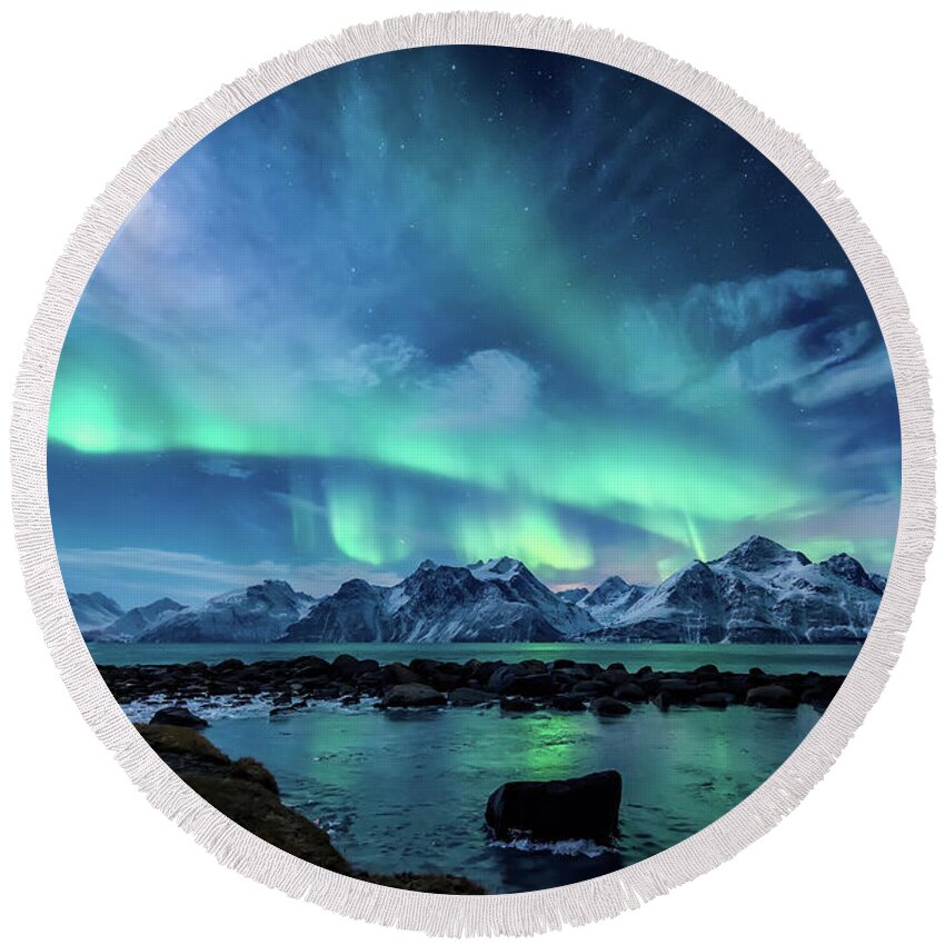 Moon Shines Aurora Borealis Northern Lights Pond Reflection Landscape Northern Lights Norway Mountains Lyngen Alps Clouds Snow Winter Ice Round Beach Towel featuring the photograph When The Moon Shines by Tor-Ivar Naess