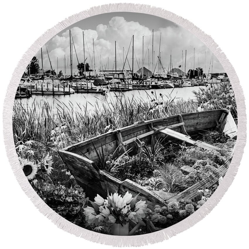 Black Round Beach Towel featuring the photograph Wildflowers Rowboat in the Harbor Black and White by Debra and Dave Vanderlaan