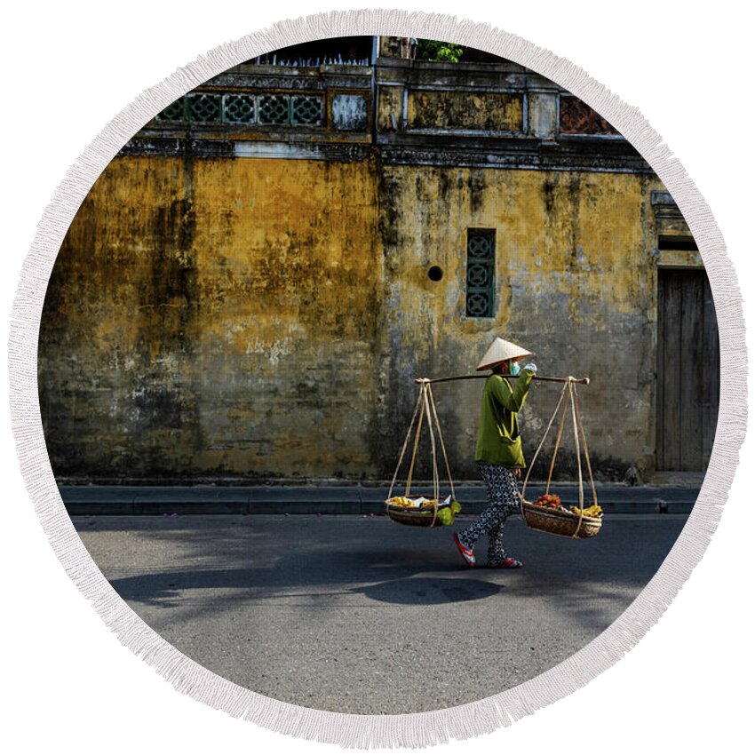 Awesome Round Beach Towel featuring the photograph Woman selling street on Hoi An ancient town by Khanh Bui Phu