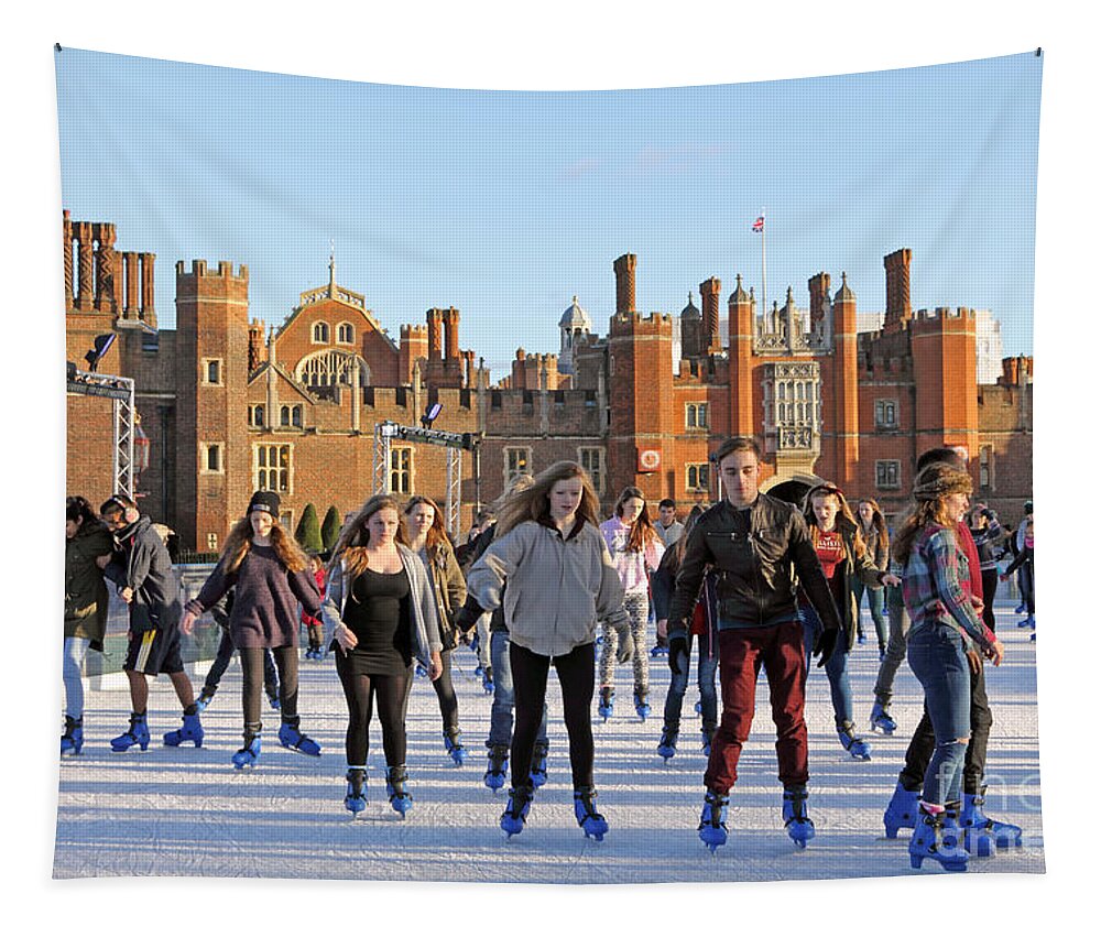 Ice Skating At Hampton Court Palace Ice Rink England Uk Tapestry featuring the photograph Ice skating at Hampton Court Palace ice rink England UK #13 by Julia Gavin