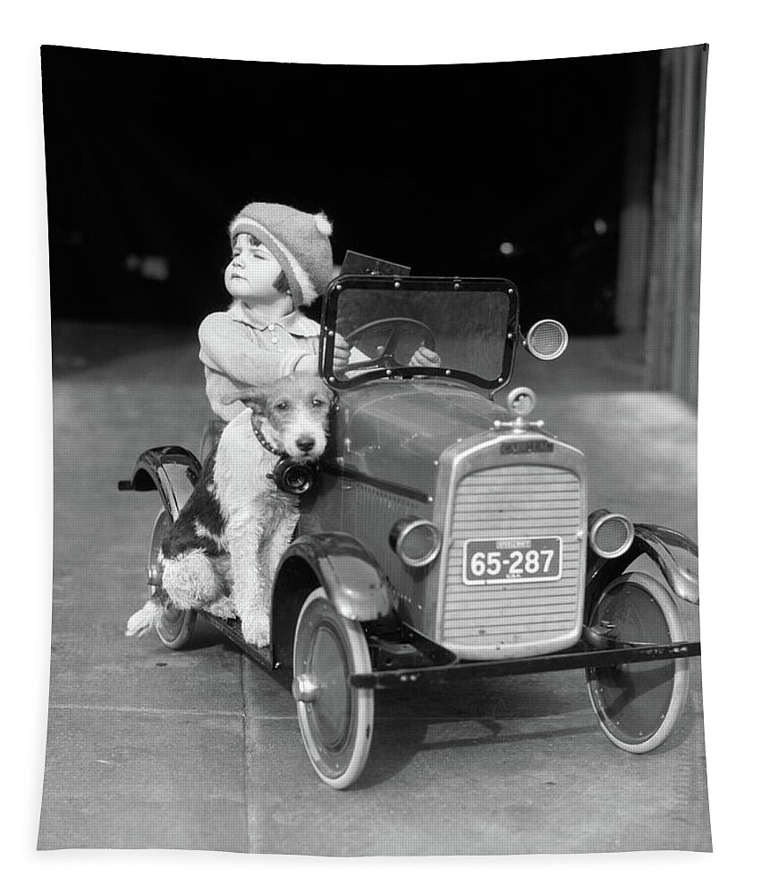 Photography Tapestry featuring the photograph 1920s Girl In Toy Pedal Car With Dog by Vintage Images