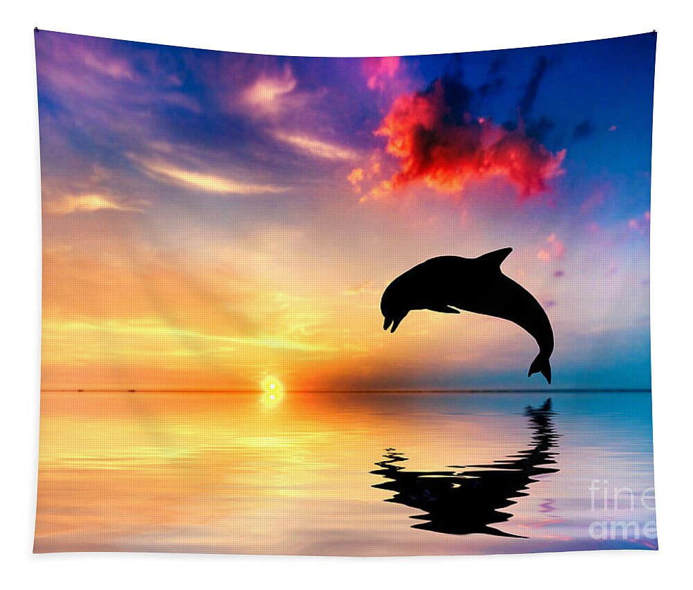 Sea Tapestry featuring the photograph Beautiful ocean and sunset with dolphin jumping by Michal Bednarek