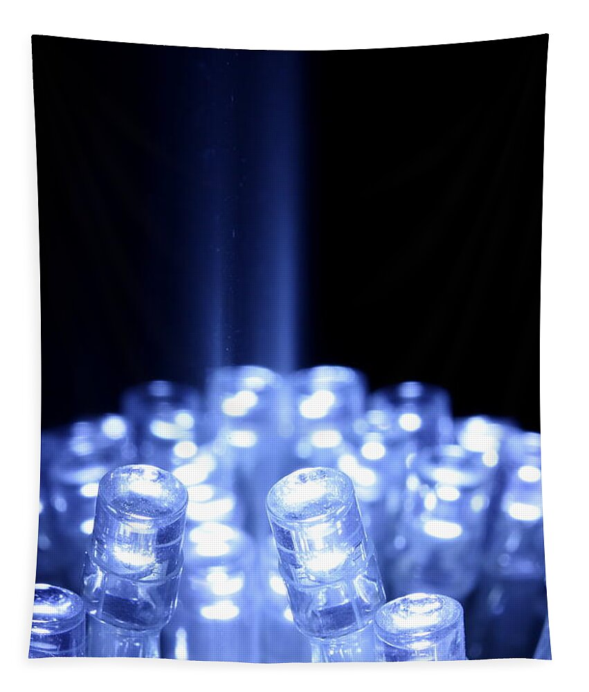 Abstract Tapestry featuring the photograph Blue LED lights with light beam by Simon Bratt