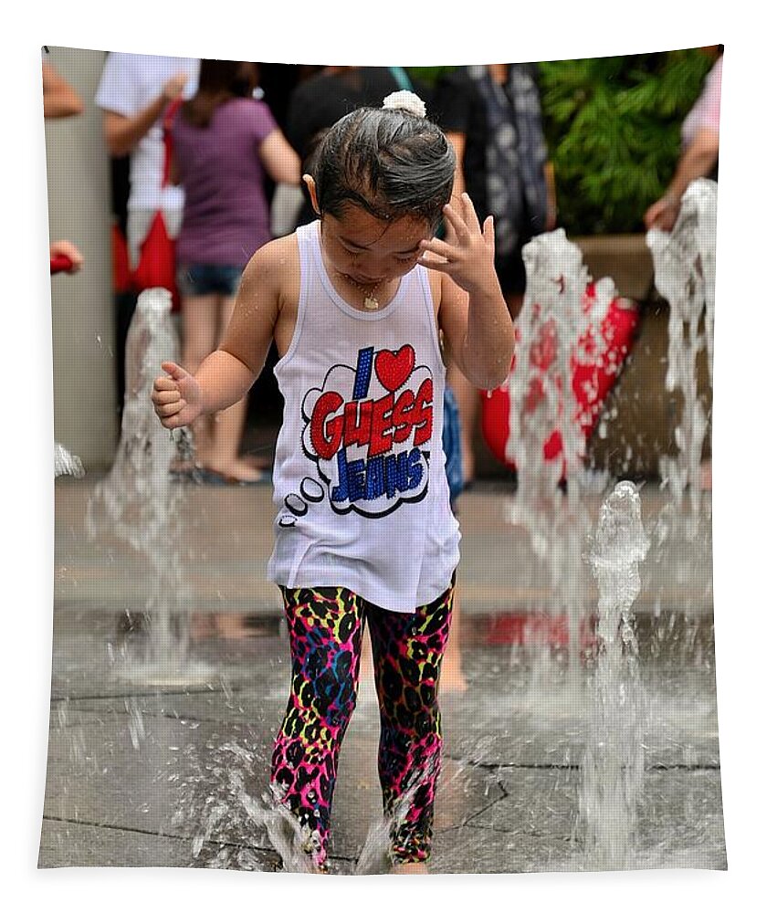 Girl Tapestry featuring the photograph Girl child plays with water at fountain Singapore by Imran Ahmed