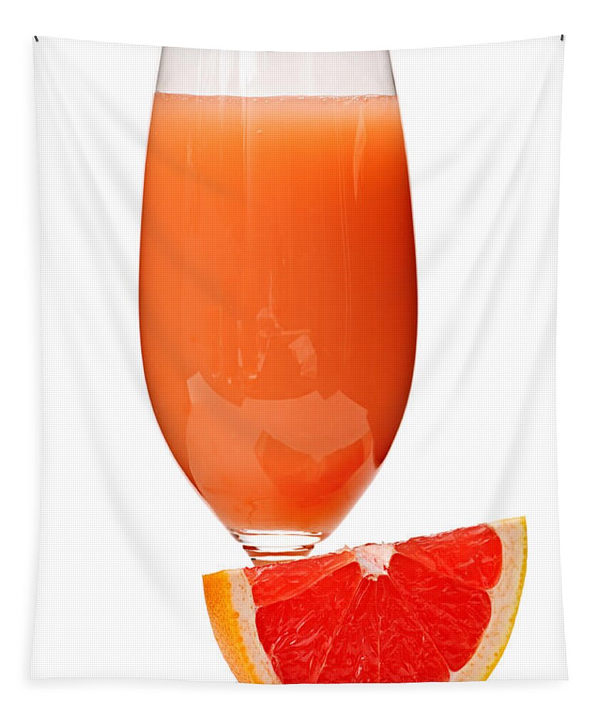 Grapefruit Tapestry featuring the photograph Grapefruit juice in glass by Elena Elisseeva