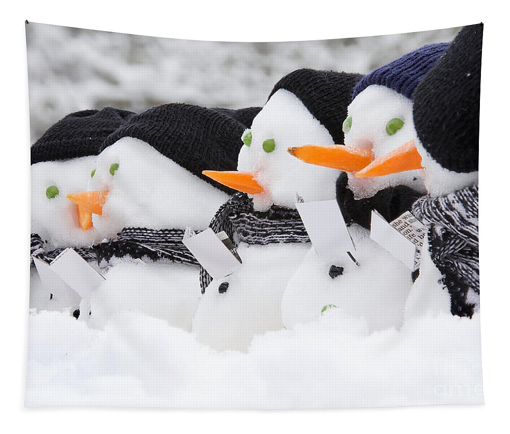 Snowmen Tapestry featuring the photograph Line of carol singing snowmen by Simon Bratt
