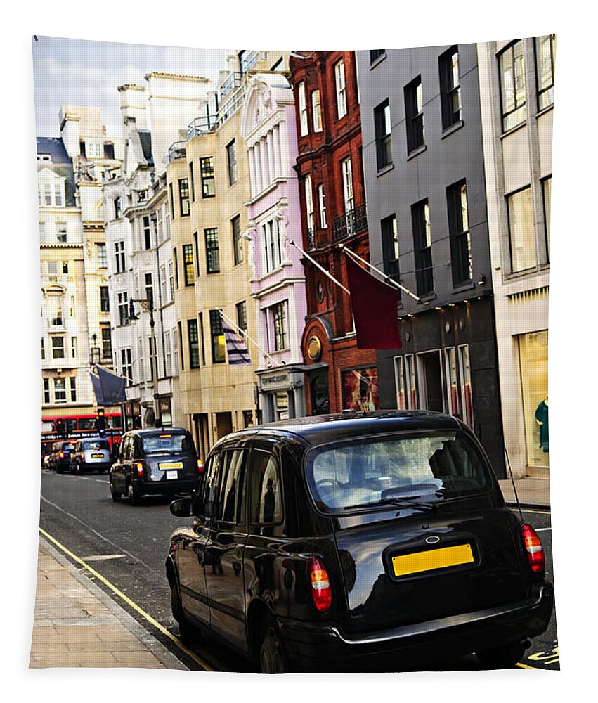 London Tapestry featuring the photograph London taxi on shopping street by Elena Elisseeva