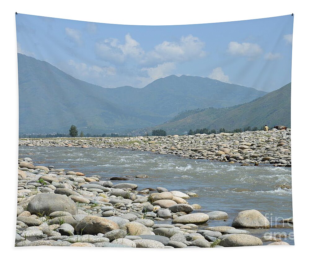 Landscape Tapestry featuring the photograph Riverbank water rocks mountains and a horseman Swat Valley Pakistan by Imran Ahmed