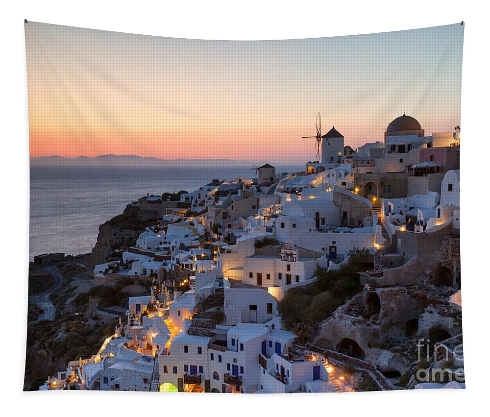Greece Tapestry featuring the photograph Romantic sunset over the village of Oia Greece Santorini by Matteo Colombo