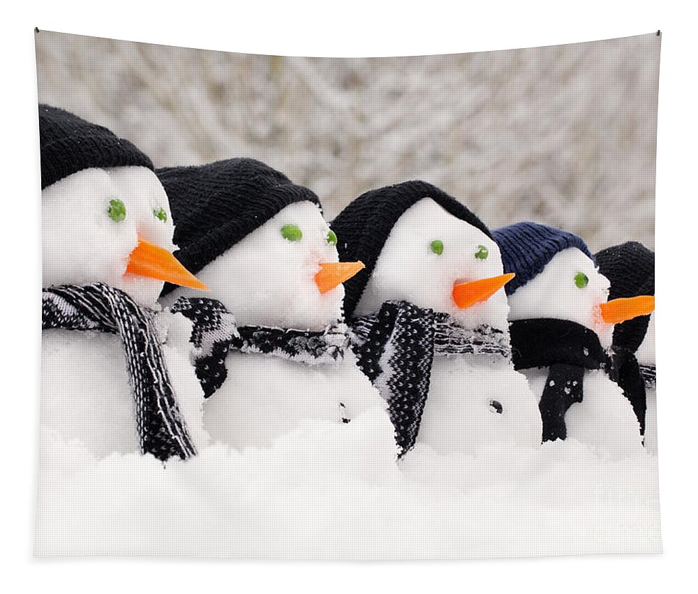 Snowmen Tapestry featuring the photograph Snowmen close up in a row by Simon Bratt