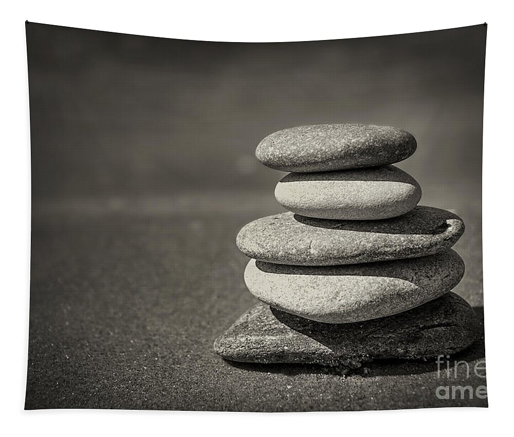 Rock Tapestry featuring the photograph Stacked pebbles on beach by Elena Elisseeva