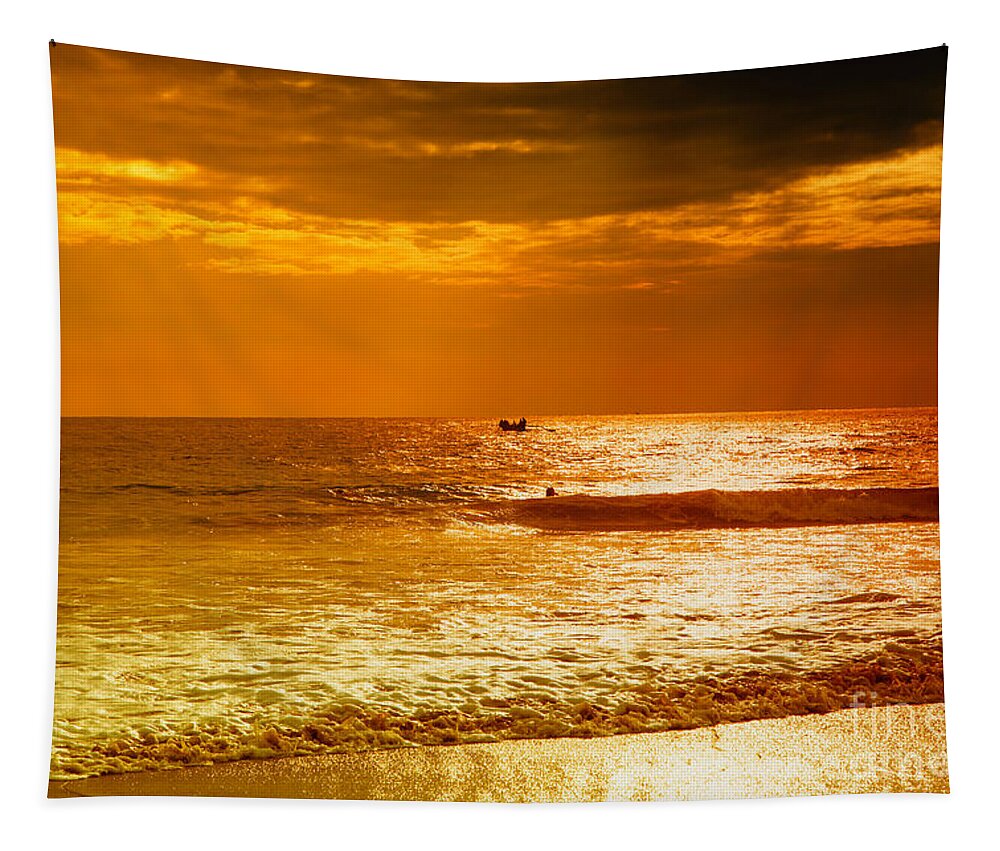 Sunset Tapestry featuring the photograph sunset in gold and red at the Hikkaduwa beach by Gina Koch