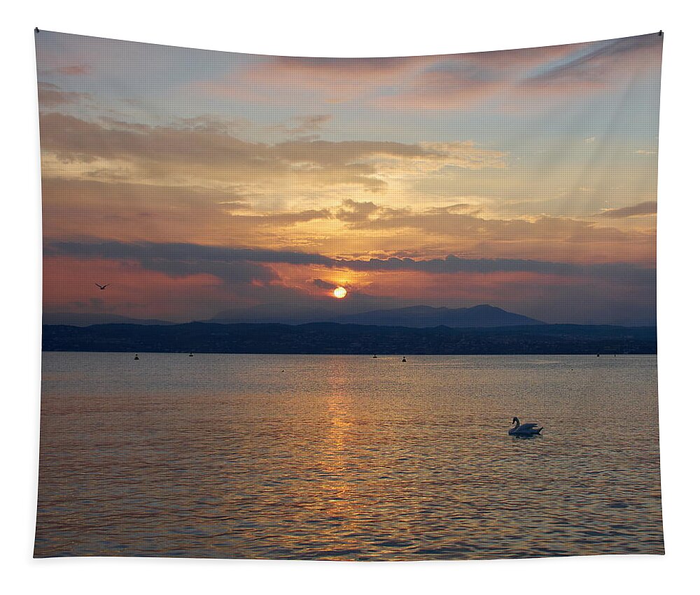 Francacorta Tapestry featuring the photograph Swan and Sunset. Sirmione. Lago di Garda by Jouko Lehto