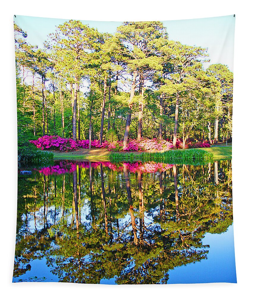 Trees Tapestry featuring the photograph Tree Reflections and Pink Flowers by the Blue Water by Jan Marvin Studios by Jan Marvin