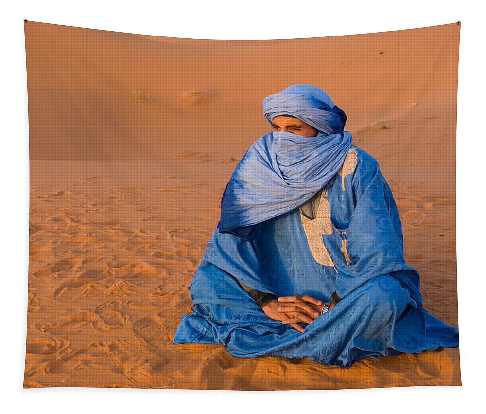 Photography Tapestry featuring the photograph Veiled Tuareg Man Sitting Cross-legged by Panoramic Images