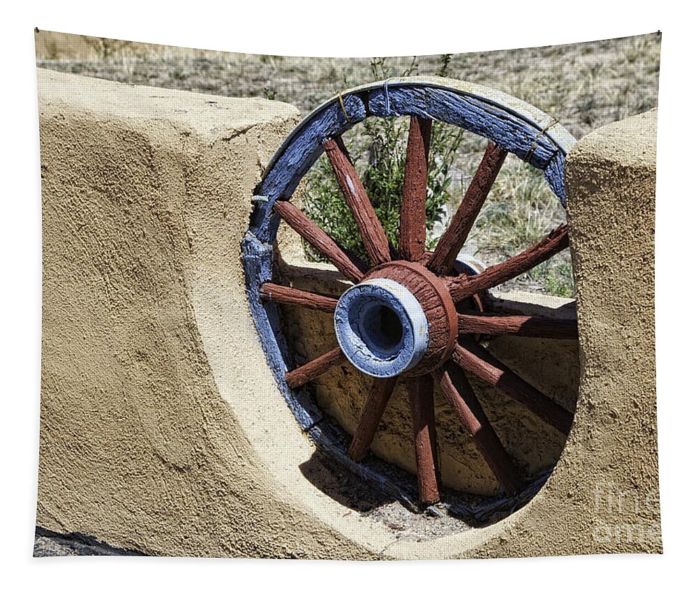 New Mexico Tapestry featuring the photograph Wagon Wheel Wall by Timothy Hacker