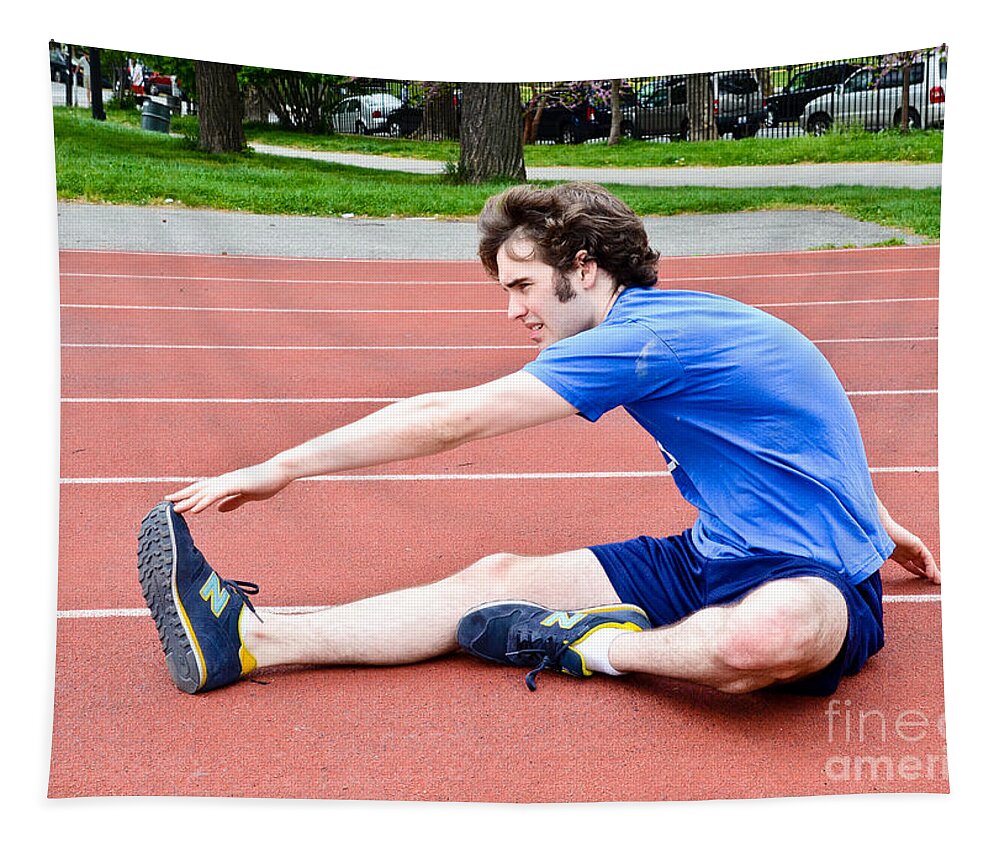 Athlete Tapestry featuring the photograph Stretching Exercises #12 by Photo Researchers