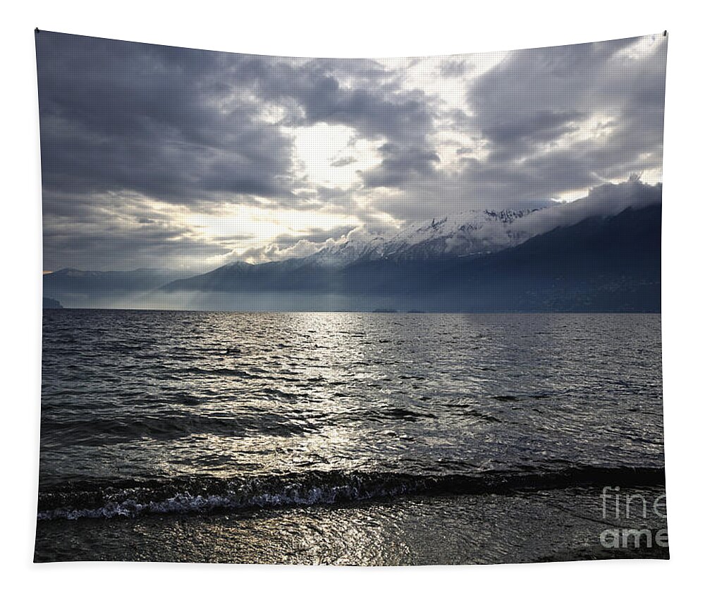 Sunlight Tapestry featuring the photograph Sunlight over a lake #2 by Mats Silvan
