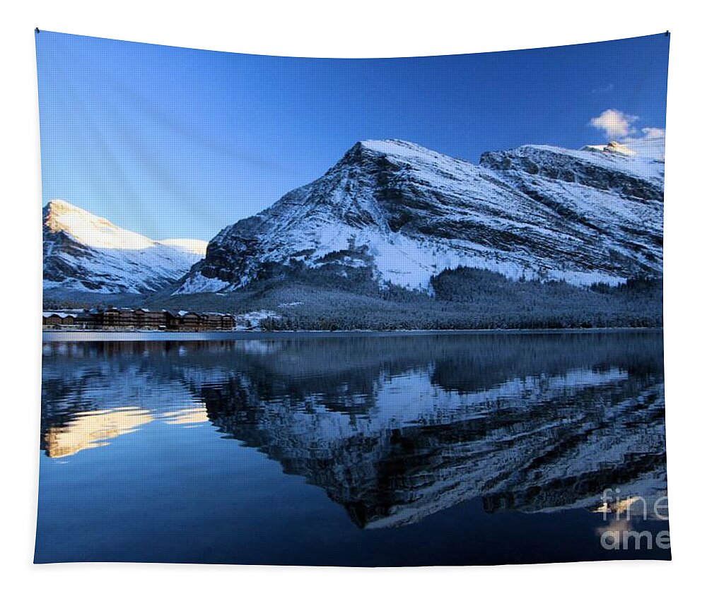 Swiftcurrent Lake Tapestry featuring the photograph Sunset Over Many Glacier Lodge by Adam Jewell