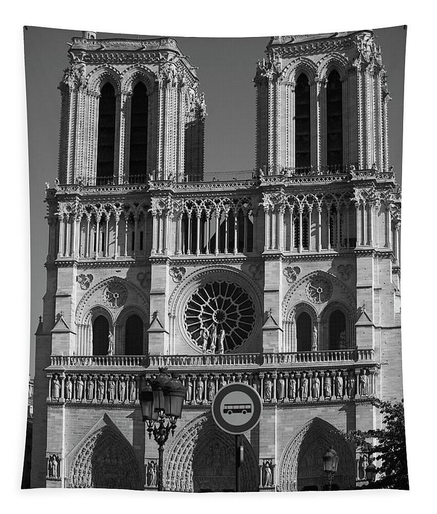 Dame Tapestry featuring the photograph Notre Dame cathedral in black and white by Patricia Hofmeester