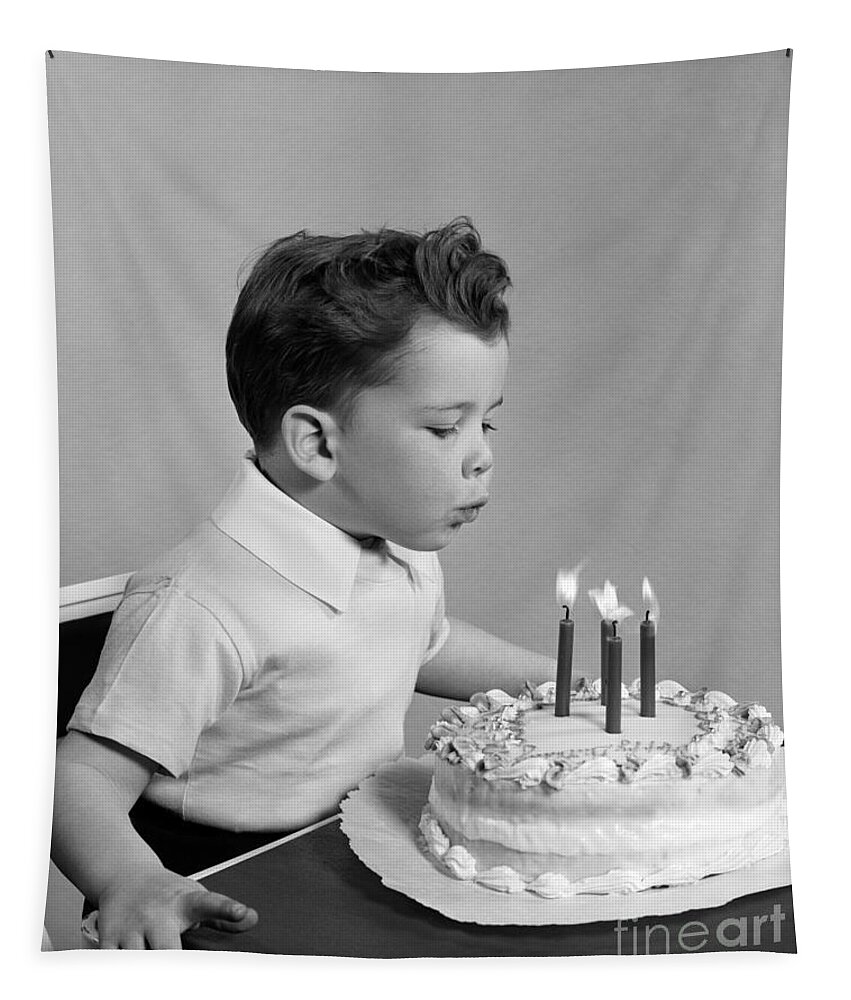 1950s Tapestry featuring the photograph Boy Blowing Out Candles On Cake, C.1950s by H. Armstrong Roberts/ClassicStock