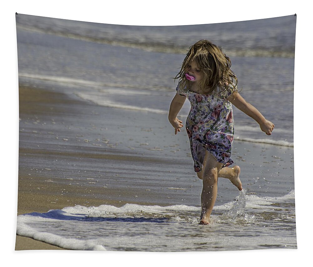 Dancing Tapestry featuring the photograph Dancing in the surf with a pink pacifier by WAZgriffin Digital
