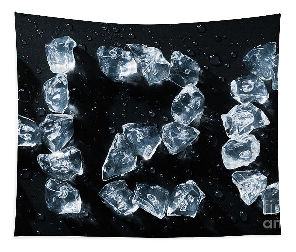 H2o Tapestry featuring the photograph H2O water symbol written in ice cubes and melting by Simon Bratt