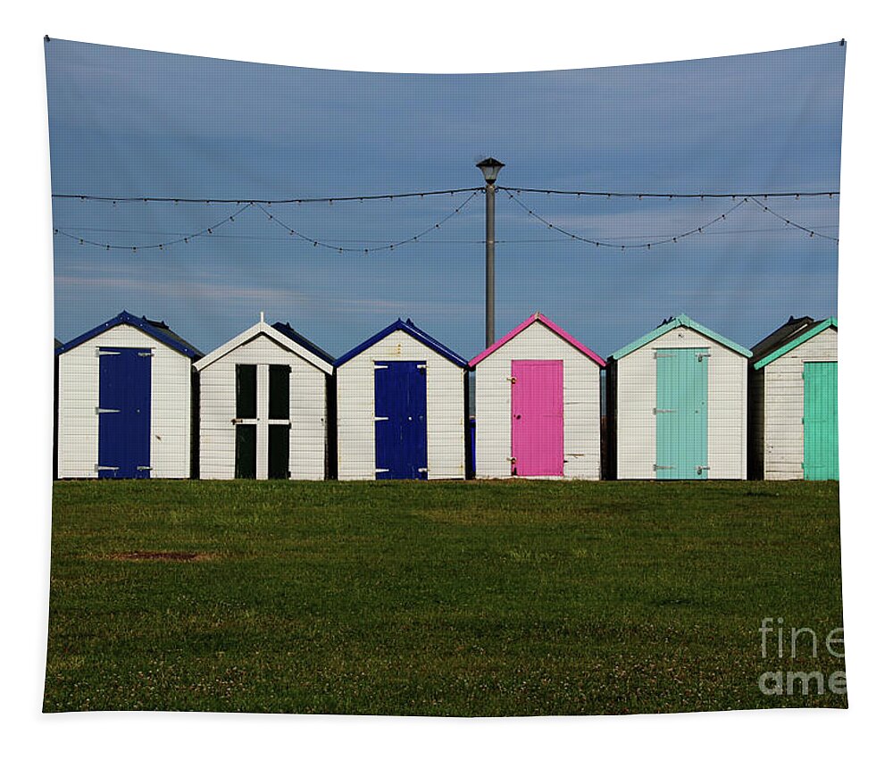 Beach Huts Tapestry featuring the photograph Holiday beach huts by Tom Conway