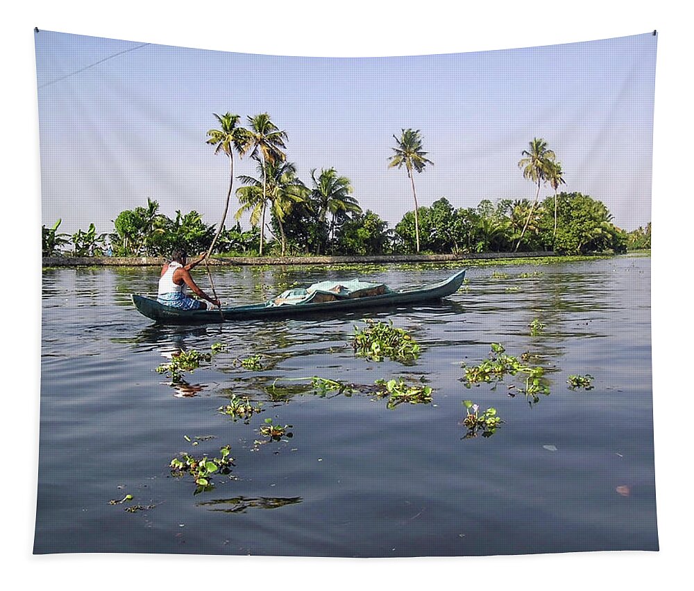 Alleppey Tapestry featuring the photograph Man boating on the salt water lagoon in Alleppey in Kerala by Ashish Agarwal