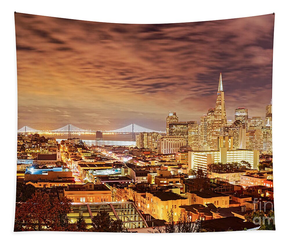 Downtown Tapestry featuring the photograph Night Panorama of San Francisco and Oak Area Bridge from Ina Coolbrith Park - California by Silvio Ligutti