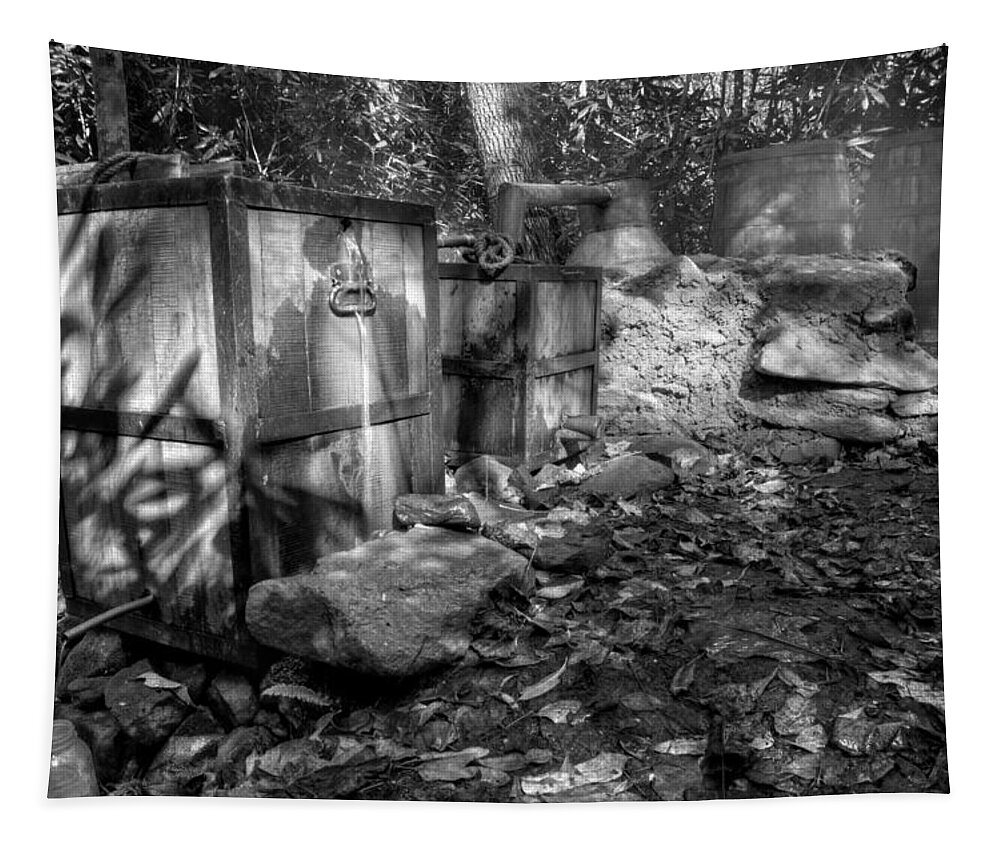 Moonshine Tapestry featuring the photograph North Carolina Moonshine Still in Black and White by Greg and Chrystal Mimbs