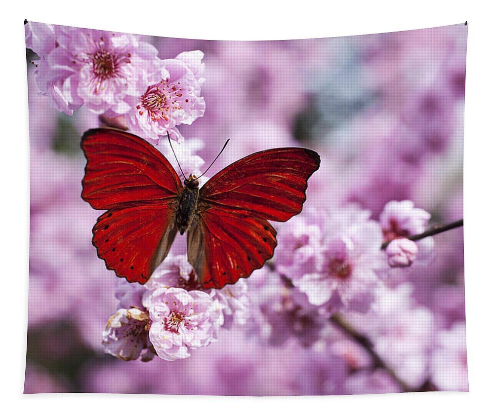 Red Tapestry featuring the photograph Red butterfly on plum blossom branch by Garry Gay