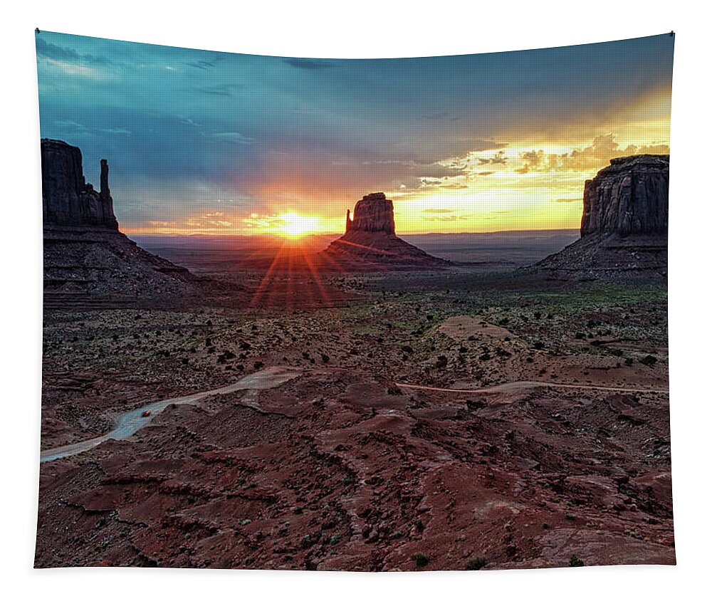 Monument Valley Tapestry featuring the photograph Sunset at Monument Valley Navajo Tribal Park Three Mittens Arizona by Silvio Ligutti