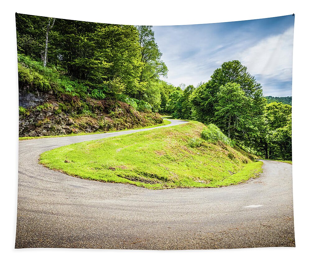 Boussenac Tapestry featuring the photograph Winding road with sharp curve going up the mountain by Semmick Photo