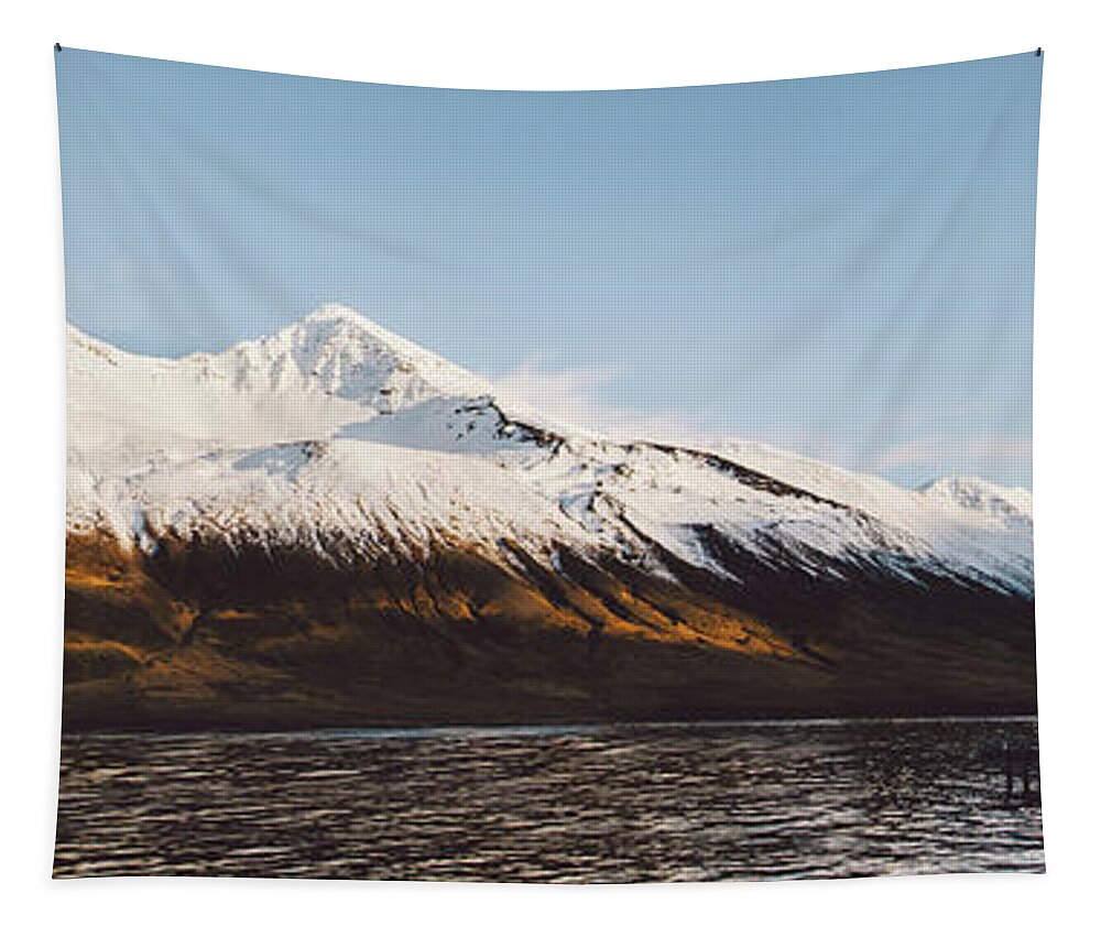 Adventure Tapestry featuring the photograph Beautiful scene of a landscape with high snowy mountains and sea. #4 by Joaquin Corbalan