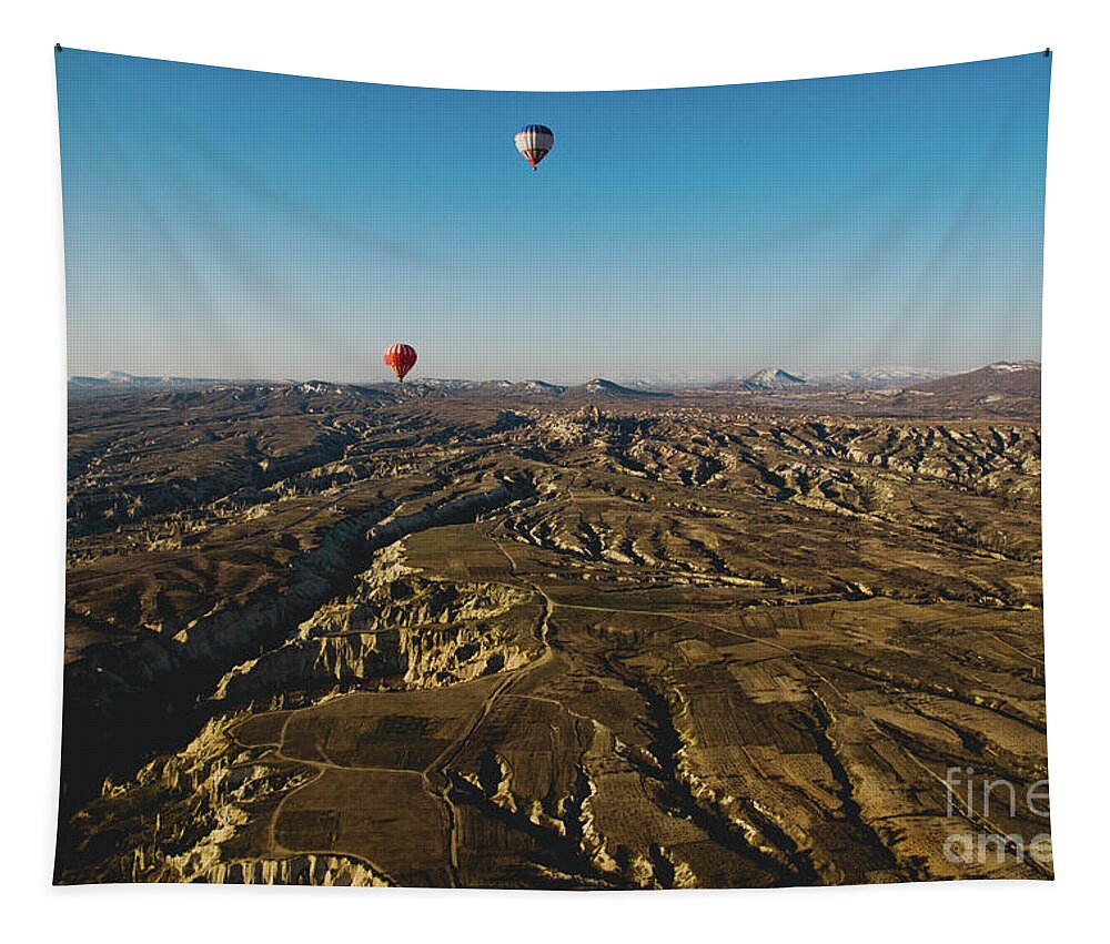 Adventure Tapestry featuring the photograph Colorful balloons flying over mountains and with blue sky #6 by Joaquin Corbalan