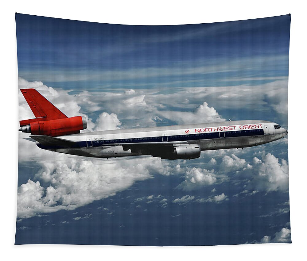 Northwest Orient Airlines Tapestry featuring the mixed media Among the Clouds - Northwest Orient DC-10-40 by Erik Simonsen