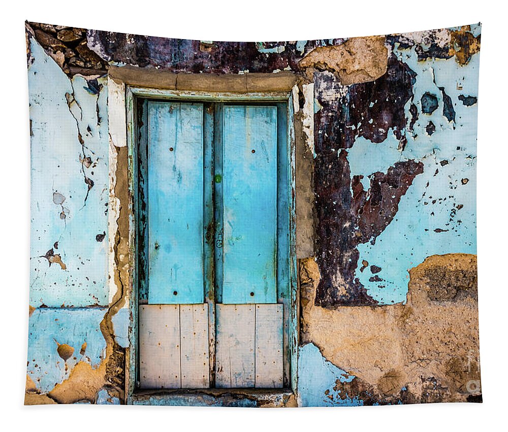 Wall Tapestry featuring the photograph Blue wall and door by Lyl Dil Creations