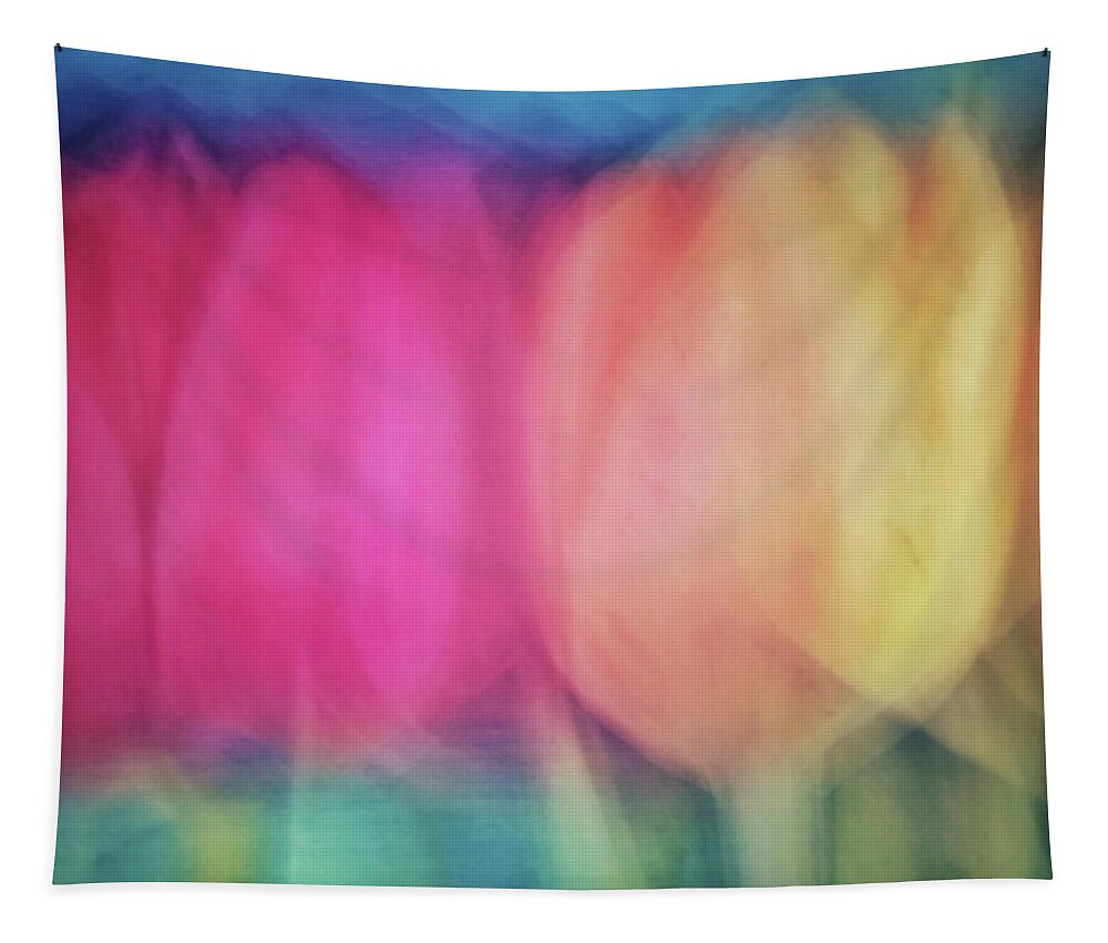 Abstract Tapestry featuring the photograph Blurred tulip flower like abstract background with pinks, yellows, greens and peach colors by Teri Virbickis