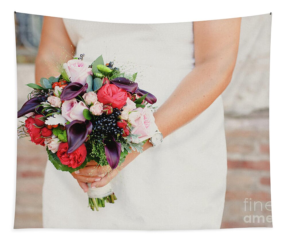 Arrangement Tapestry featuring the photograph Bridal bouquet held by her with her hands at her wedding by Joaquin Corbalan