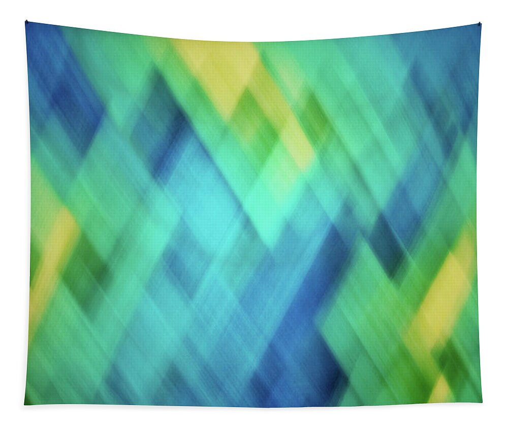 Abstract Tapestry featuring the photograph Bright blue, turquoise, green and yellow blurred diamond pattern abstract by Teri Virbickis