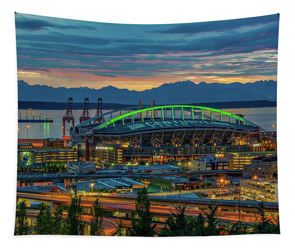 Century Link Field Tapestry featuring the photograph Century Link Field Glow by Emerita Wheeling